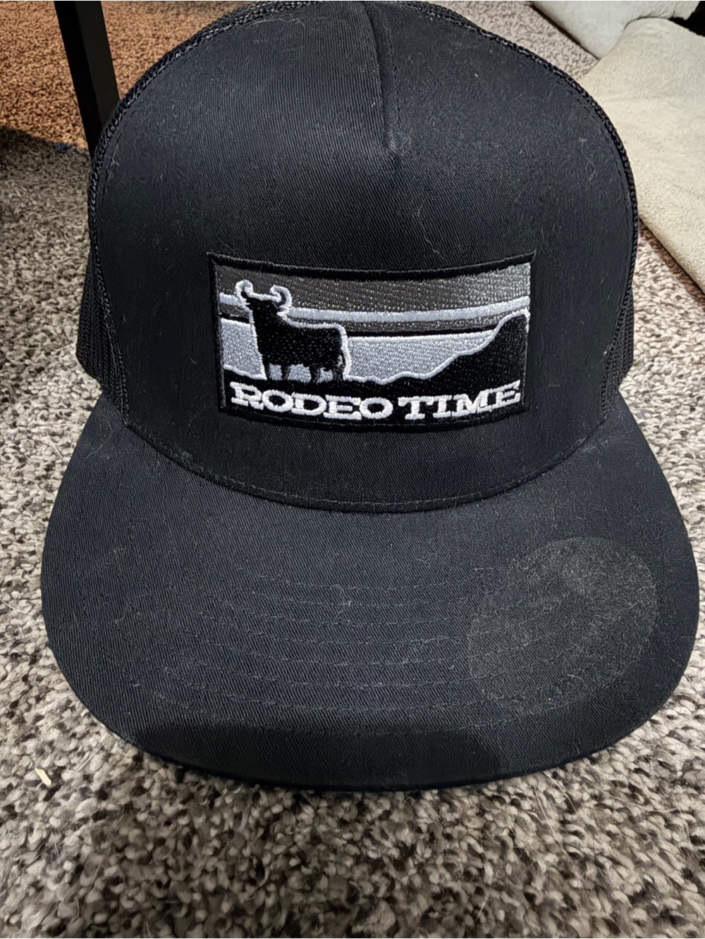 Rodeo Time Black Patch Trucker Hat